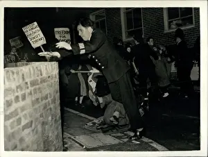 Stumbles: Students demonstrate outside Daily Worker offices, London