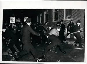 Grappled: Students demonstrate outside Daily Worker offices, London
