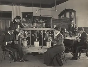 20 40 Years Old: Students learning to operate a cheese press screw