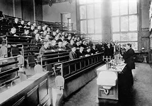 Explain: Students at a lecture, 1905