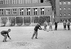 Teach: Students playing criquet, 1931