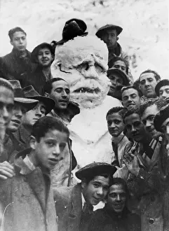 Astonishing: Students pose with a snowman