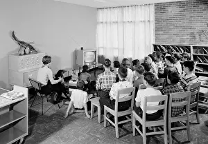Schenectady: Students and their teacher watch educational ?