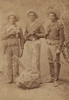 Revolvers: Studio group portrait of three African American