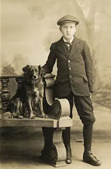 Goodman: Studio portrait, boy with a dog