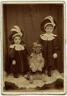 Lacy: Studio portrait, two children with dog