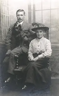Everard: Studio portrait, couple with dog