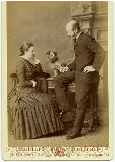 Pleated: Studio portrait, couple with terrier dog