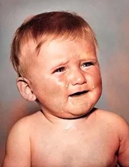Cheeks: Studio portrait, little boy crying