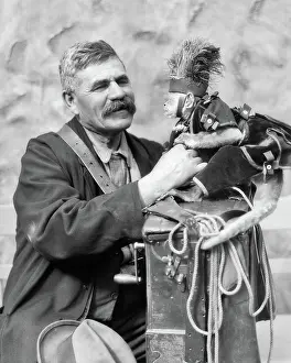 Peripatetic: Studio Portrait Man Organ Grinder posing with Monkey in