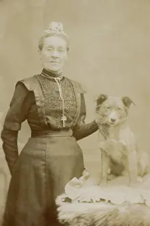 Furry: Studio portrait, middle aged woman with terrier