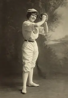 Pitching: Studio portrait of a smiling young woman in