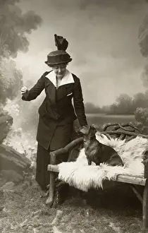 Dachshunds: Studio portrait, woman with dachshund