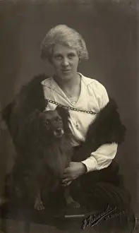 Fairweather: Studio portrait, woman with dog