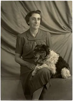 Pleated: Studio portrait, woman with dog