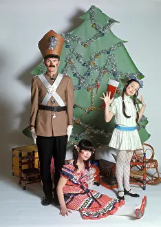 Nutcrackers: Studio Setting Of Family Dressed
