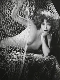 Manasse: Study of a naked woman behind a net