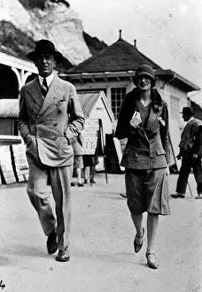 Stroll: Stylish couple stroll along an English Seafront