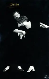 Tangoing: A stylish finely-dressed German couple dancing the Tango
