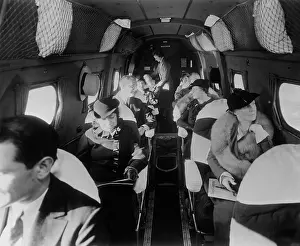 Stylishly: Stylishly dressed passengers seated in a ?
