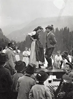 Styrian: Styrian dance of a pair on a tavern table Outdoors in