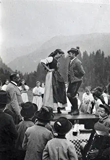 Styrian: Styrian dance of a pair on a tavern table Outdoors in