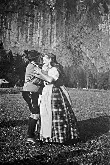 Styrian: Styrian dance of a pair in traditional costume on a