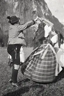 Styrian: Styrian dance of a pair in traditional costume on a