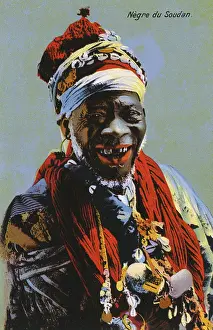 Cowrie: Sudanese old man with a very toothy grin
