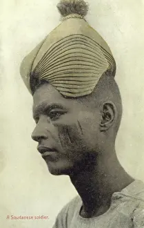 Scarification: Sudanese soldier with remarkable hat