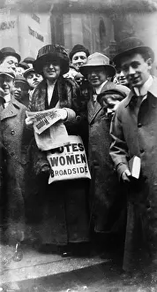 Leaflets: Suffrage campaigner with leaflets, USA