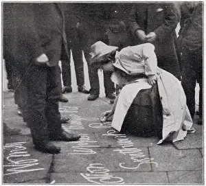 Pavements: Suffragette writing on the pavement 1909