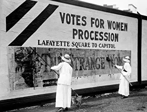 Reform: Suffragettes putting up posters for the upcoming parade