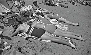 Sunbathers: Sunbathers on beach, Shanklin, Isle of Wight
