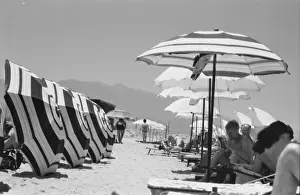 Holidaymakers: Sunbathers under striped parasols - Kos