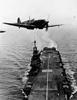 The Hugh W. Cowin Aviation Collection: Supermarine Seafire IIc above carrier