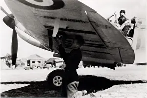 The Hugh W. Cowin Aviation Collection: Supermarine Spitfire IIa being armed