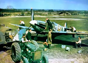 The Hugh W. Cowin Aviation Collection: Supermarine Spitfire IX-being armed and pre flighted of