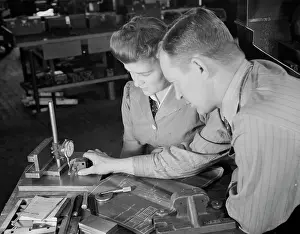 Blueprint: Supervisor checking dimensions of completed V-block, 1942