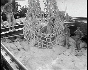 Unloaded: Supplies Being Unloaded in Naples Harbour