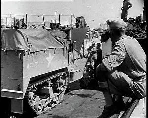 Backing: A Supply Truck Backing Into a Supply Depot