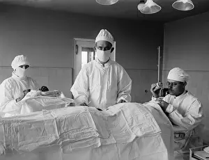 4 People: Surgical team before the operation begins, with