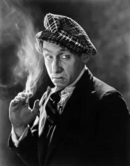 Skeptic: Surly man smoking cigarette