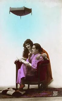 Surrealism: Very surreal French pair below a hanging lantern