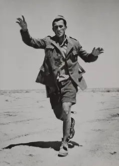 Lull: Surrendering Italian infantryman running towards
