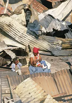 Shacks: Surrounded by the burnt remains of her and others