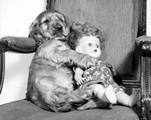 Cuddling: Susi - with doll in chair