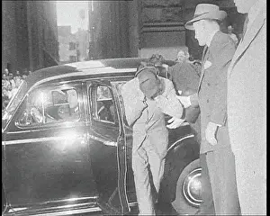 Suspected: A Suspected Agent Being Led to Trial