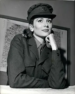 Waugh: Suzy Parker as an ATS officer