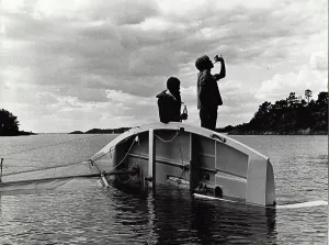 Afloat: Swedish scouts and upturned sailing boat